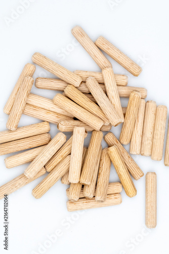 Natural wood sticks arranged casually on white background