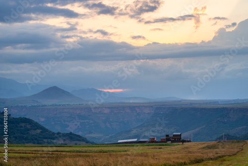 Fabulous sunset landmark with guest house and mountains, Armenia