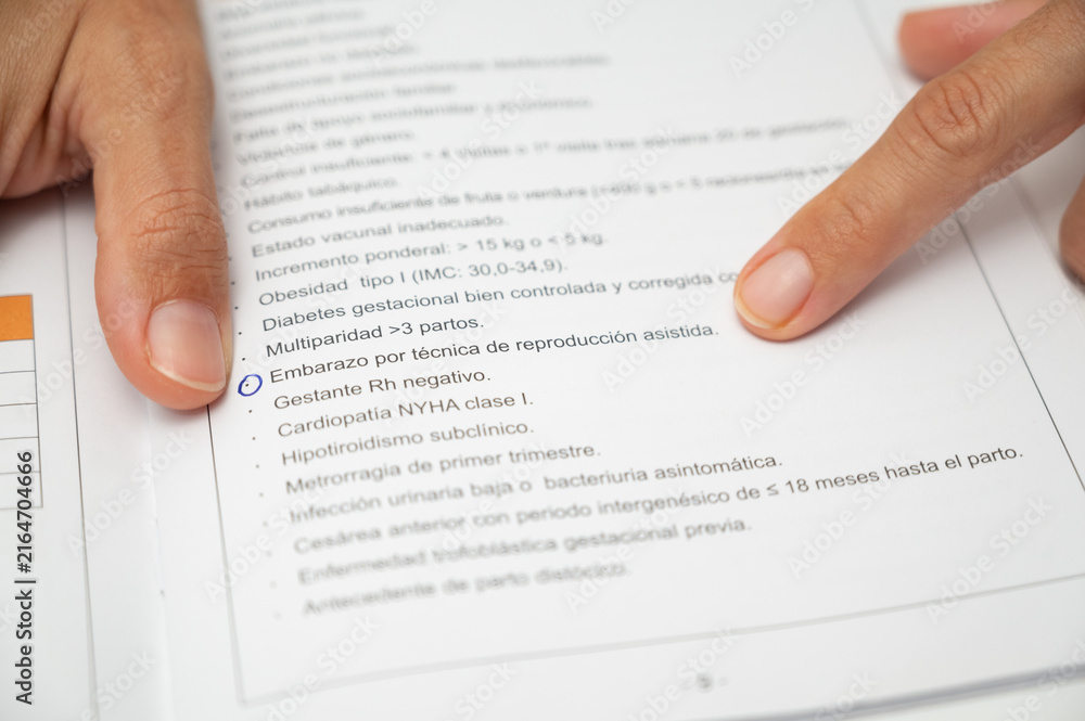 Obraz premium Doctor pointing assisted reproduction pregnancy medical document