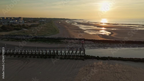 Aerial view of the Courseulles sur mer pier next to the mouth of the Seulles river
