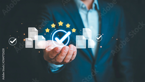 A professional business photo of a hand holding a digital holographic quality assurance icon representing certified document compliance and excellence