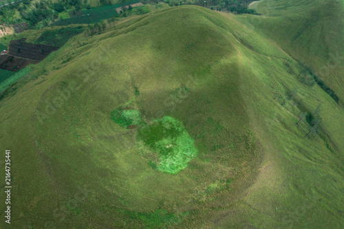 Konstfotografi Aerial View of Vibrant Green Rolling Hill Landscape