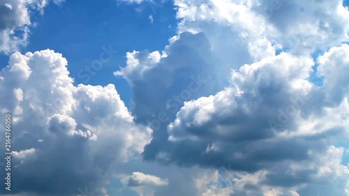 Bright Blue Sky Filled with Fluffy White Cumulus Clouds on a Sunny Day