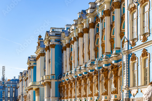 Grand palace with ornate columns and blue gold accents
