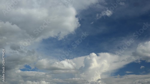 Timelapse of white clouds in blue sky