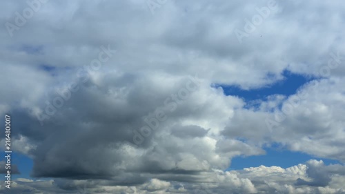 Timelapse of white clouds in blue sky