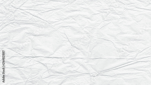 Fotografía Flattened white paper with prominent horizontal fold line and scattered creases macro texture background for graphic arts and web design highlighting unique texture and surface detail