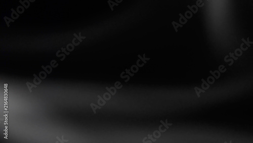 monochrome dark background with smooth gradient curves and soft shadows in black tones