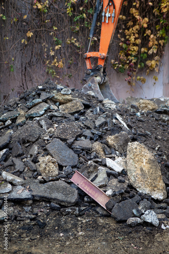 Excavator in action on an urban construction site