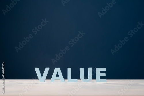 Business value and value creation concept with blue letters