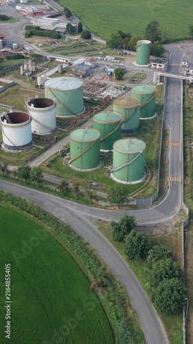Oil Storage Terminal with Large Petroleum Tanks and Fuel Infrastructure, Aerial Drone View, Italy