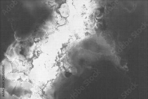 Abstract halftone pattern background with grainy texture and high contrast black and white dots