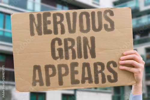 Obraz na plátně "Nervous grin appears" Uncontrollable smile due to anxiety
