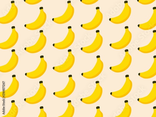 Pattern of yellow bananas with dark tips aligned diagonally on a light beige background. Each banana is illustrated with a uniform shape and size, creating a seamless, repeating pattern. The simplicit