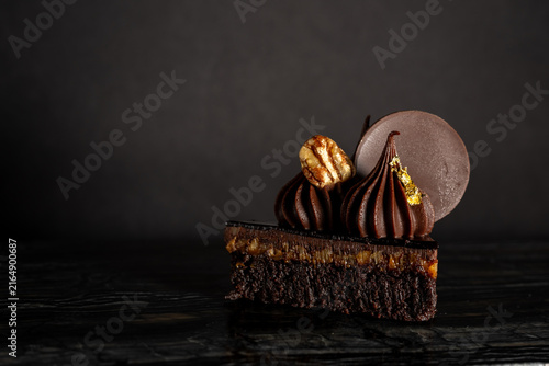 Close-Up of Rich Indulgent Chocolate Turtle Brownie Dessert on a Dark Background