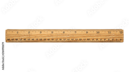 Old wooden ruler displaying metric and imperial measurement scales for education, carpentry, and design