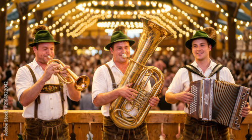 Bavarian musicians in traditional lederhosen playing trumpet, tuba and accordion under string lights at Oktoberfest tent. Bavarian carnival Oktoberfest festival celebrating concept with copy-space.