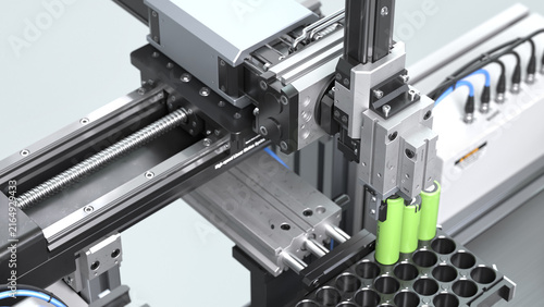 Принти на полотні Automated high-speed linear motion system picking and sorting green lithium-ion battery cells into a pack module on an assembly production factory line