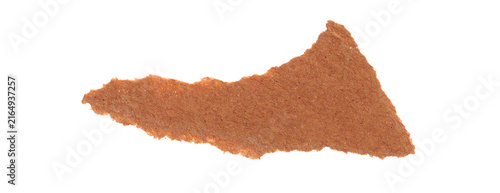 Rough torn kraft paper strip with natural brown fiber texture