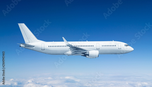 Canvastavla Blank White Commercial Airplane Flying High Above Clouds in Clear Blue Sky Side