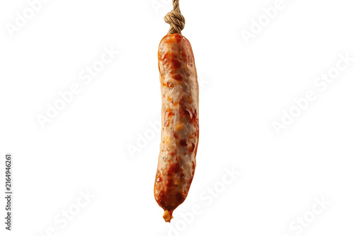 Obraz na płótnie Cured sausage hanging vertically from string