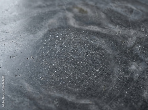 Dark grey concrete surface with swirl pattern texture concrete abstract background material