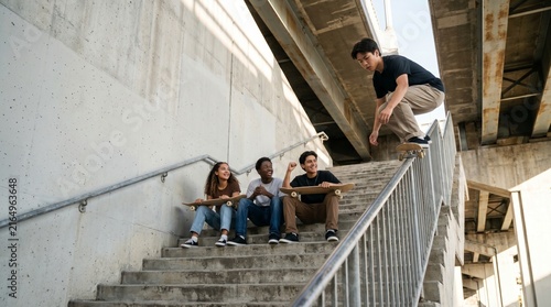Skater Meetup On Concrete Urban Staircase, Friends Cheering Skateboarder In City Environment, Street Culture And Youth Lifestyle, High Contrast, Copy Space
