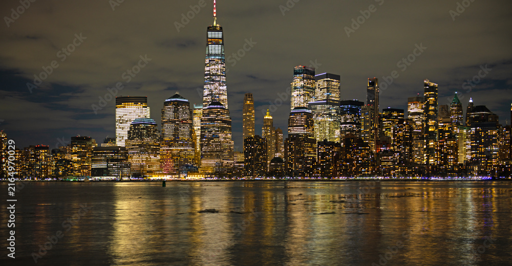 Fototapeta premium New York Manhattan golden panorama at night. New York panoramic cityscape. New York City iconic panorama, NYC. New York City travel destination.