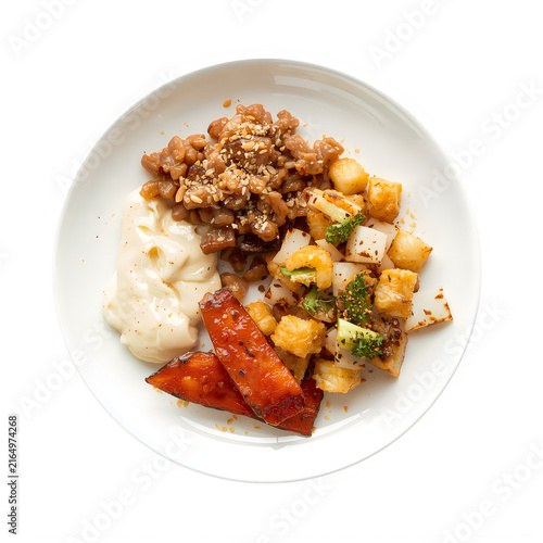 Close-up of mixed vegetable and meat dish on plate