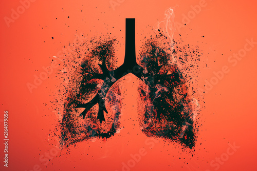Human lungs depicted as crumbling into dust and debris against vibrant orange backdrop, symbolizing illness decay. Smoking addicted. Cancer concept. 