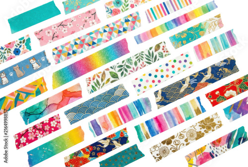 Assorted colorful decorative adhesive paper tapes on black background