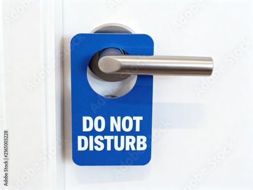Do Not Disturb Hanger Sign on Silver Office Door Knob