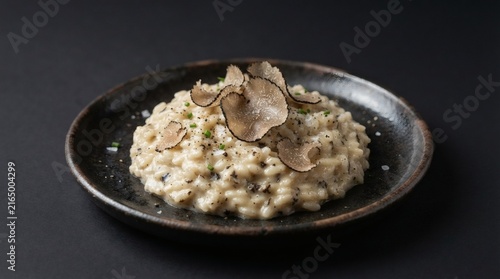 Close Up Truffle Risotto Mound Shaved Truffle Curl Plate Isolated Plain Dark Seamless Background

