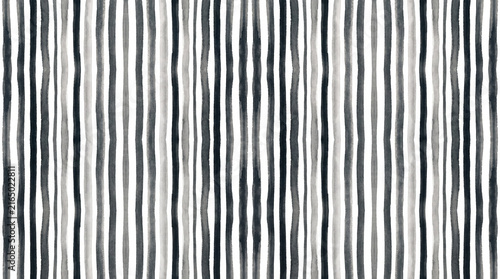 A seamless background pattern featuring hand-painted monochrome watercolor vertical stripes in varying shades of black and grey on a white surface.