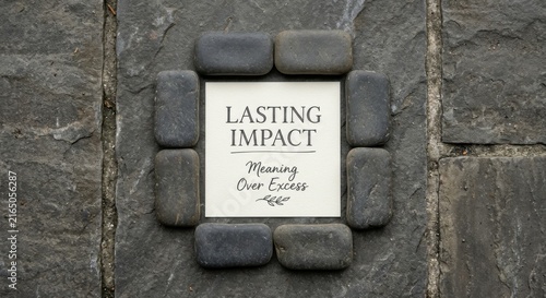 Tapety artystyczne Smooth Stones Framing 'Lasting Impact Meaning Over Excess' Text
