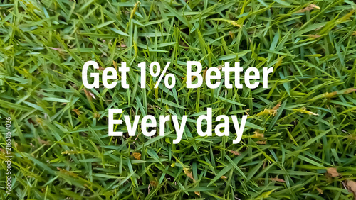 Obraz na plátně Get 1% better every day motivational quotes with green grass background