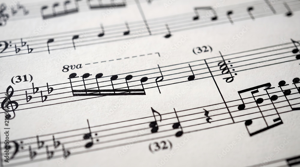 Fototapeta premium Close-up Shot of Musical Sheet Paper with Treble Clef and Notes