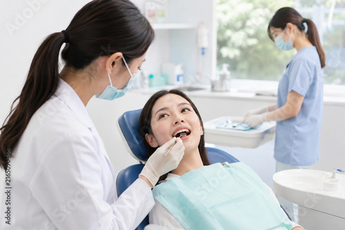 Young Woman Having Routine Dental Checkup