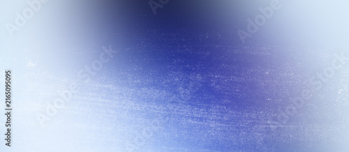 Abstract dusty distressed texture overlay background in cool blue and white color gradient for serene graphic design and calming artistic presentations.