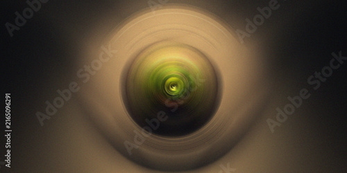 Yellow and green radial blur background with abstract circular details.