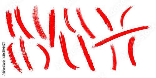 Set of various red paint brush strokes isolated on a white background for graphic design projects
