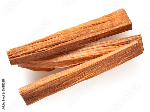 Red sandalwood sticks isolated on white background, top view.