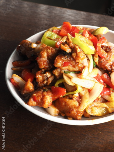 Wall Mural stir fried fish fillet with garlic, onion, chili and bell peppers
