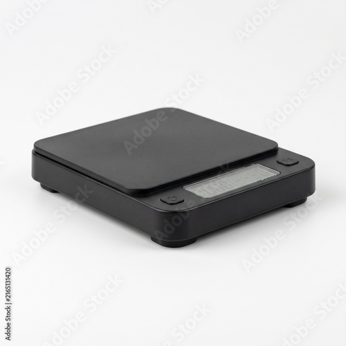 Modern black digital coffee scale with LED display isolated on white background