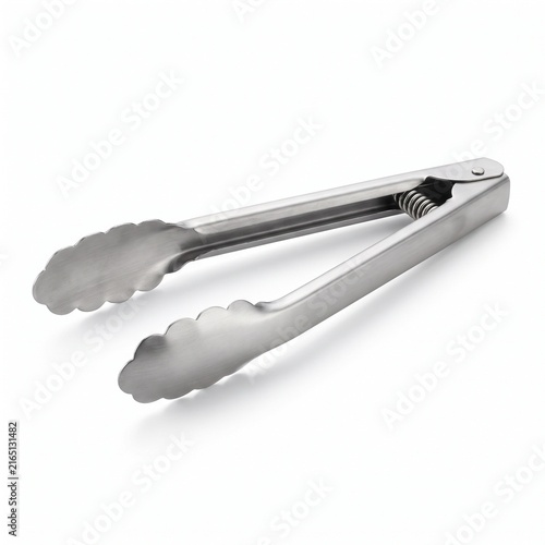 Stainless steel kitchen serving tongs with scalloped edges isolated on white background