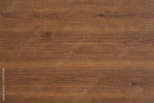 Photography Rich walnut wood texture with natural grain patterns, warm brown tones, and subtle organic variations, ideal for furniture, interior surfaces, flooring, and realistic material backgrounds