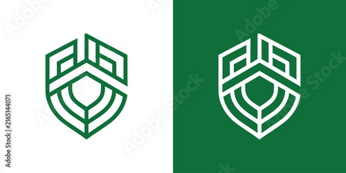 Green shield with house emblem for protection logo.