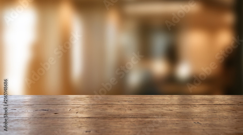 Rustic Wooden Tabletop with Warm Blurred Interior Background and Copy Space for Product Display