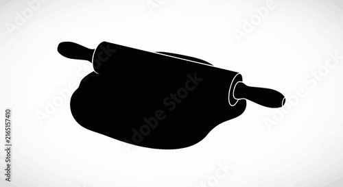 Photography Black silhouette of a rolling pin on dough with against white background prepara