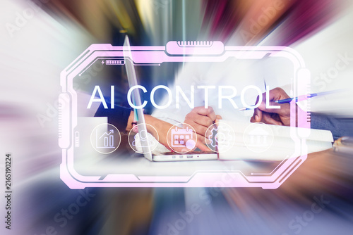 People work on a laptop with a display of AI control in a modern office setting during the daytime